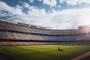 photo of a person standing on football field